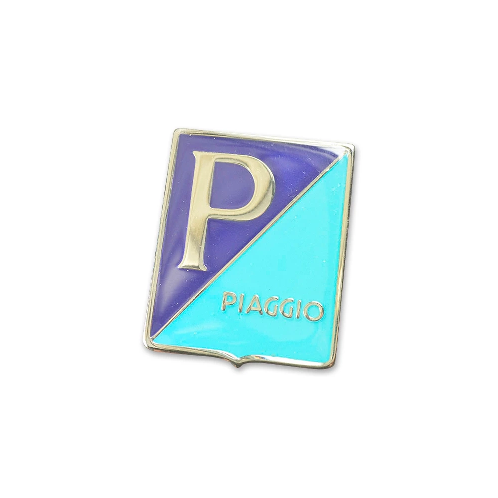 Emblème PIAGGIO 36x47mm métal, 4 attaches, bleu clair